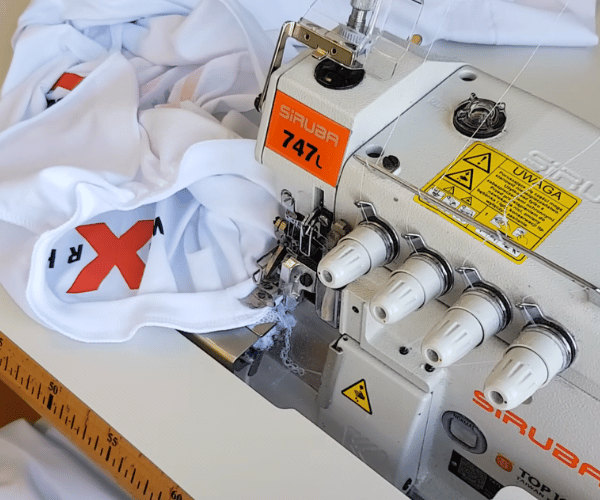 Custom t-shirt cutting and stitching in garment factory
